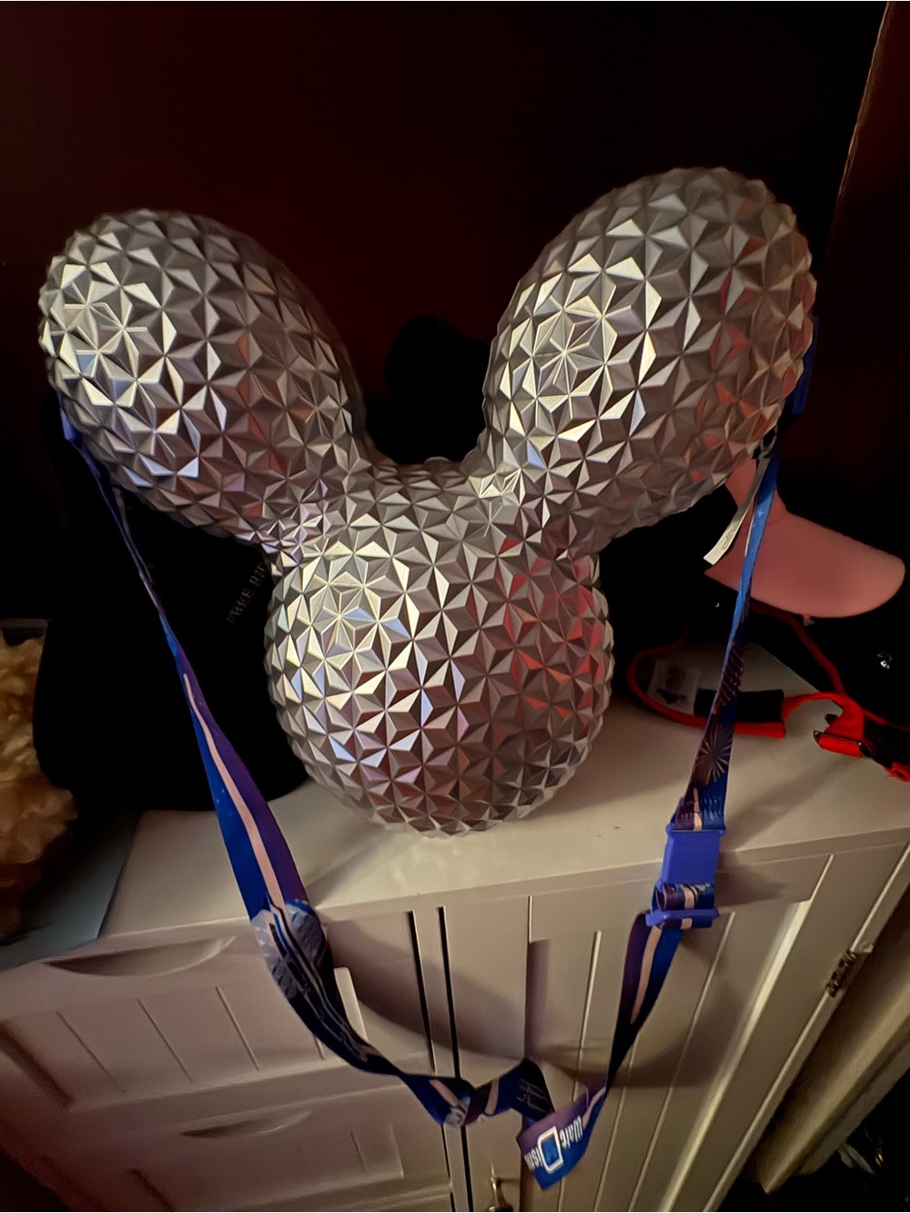 Silver Geometric Mickey Ear popcorn bucket with Blue Lanyard that lights up